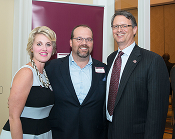 Casey Oliver, Chris Parvin and Texas A&M Law School Dean Andrew P. Morriss