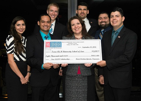 DHBA presents scholarship check to Texas A&M Law School HLSA chapter